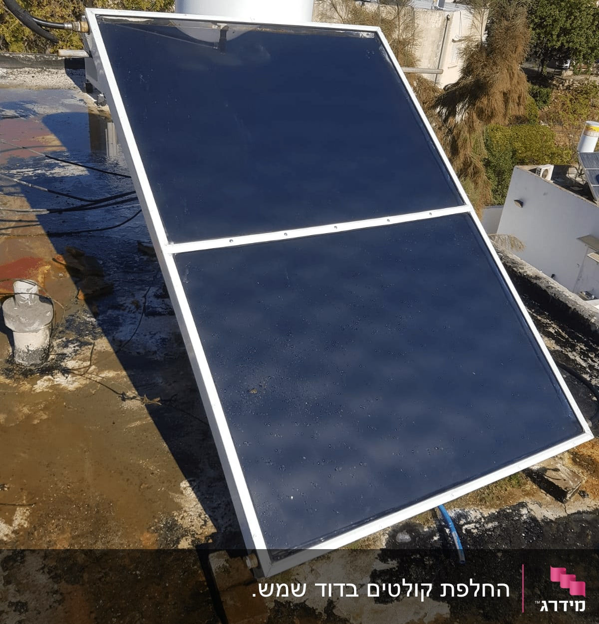 פאנל סולארי על גג עם דוד שמש